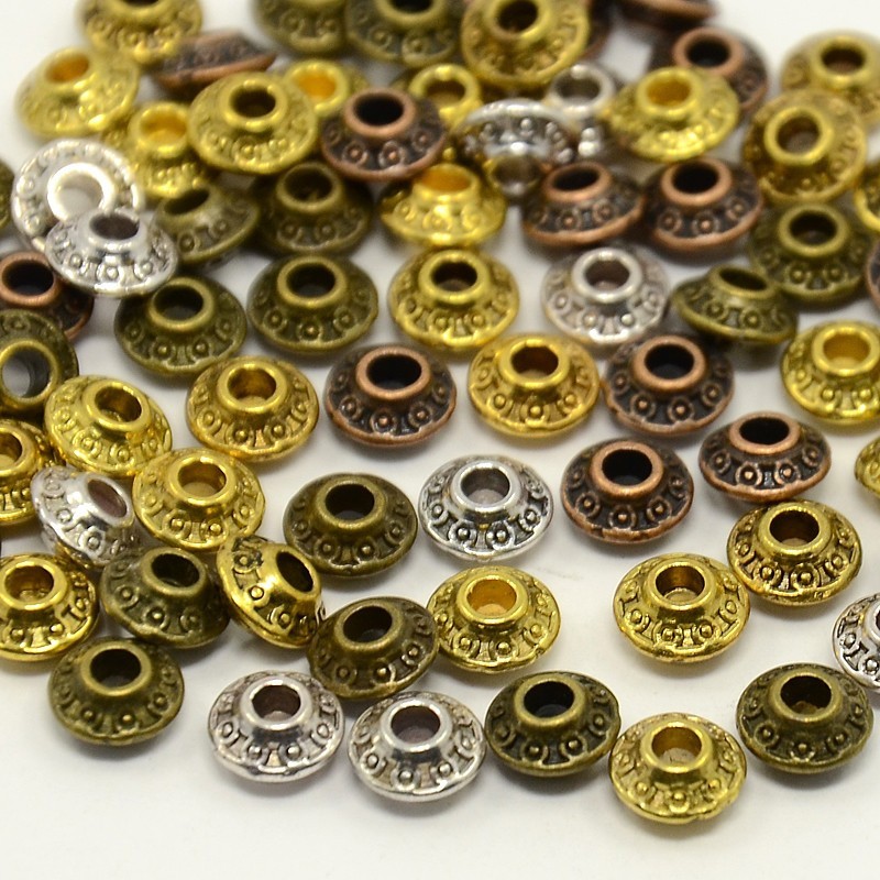 Lot de 20 perles rondelles tibétaines en métal argenté - 6,5mm x 3,5mm - avec un trou de 2mm